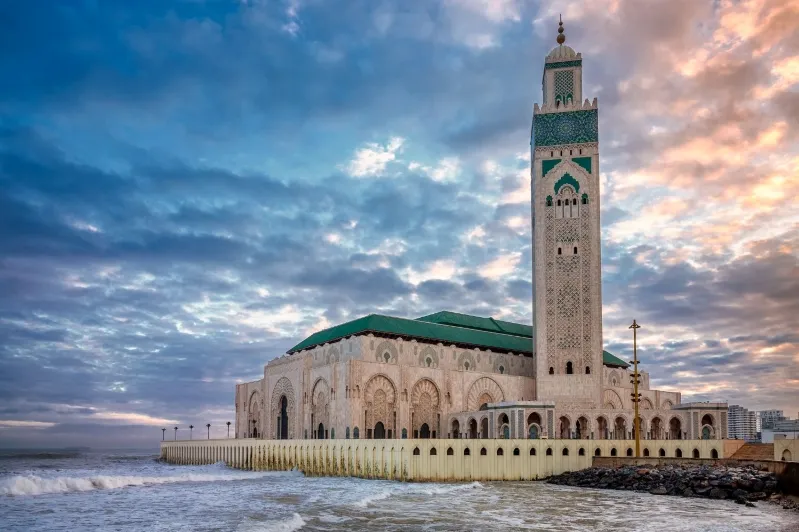  Islamic mosque on the beach in Casablanca, featured in tours and airport transfers.