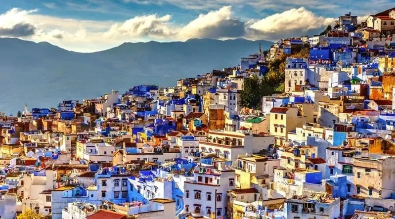 Scenic view of Chefchaouen, Morocco, showcasing its iconic blue buildings, popular among students on trips to Morocco.