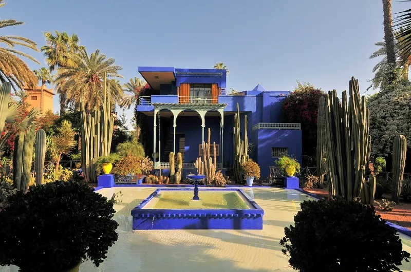 Blue house in Marrakech, Morocco, showcasing traditional architecture and vibrant colors, a must-see attraction.